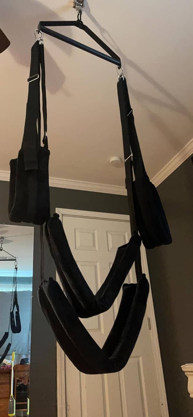 black sex swing hanging in reviewer's home