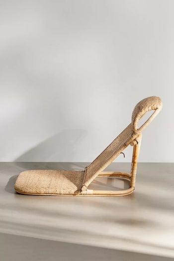 the woven rattan beach chair from the side