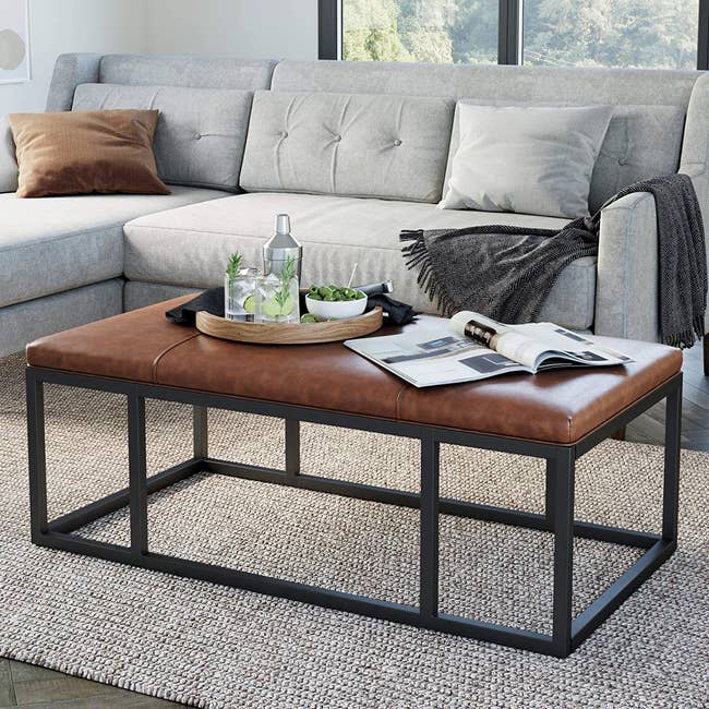 the upholstered table which has metal legs