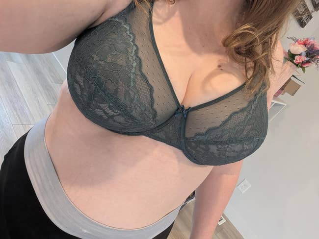 A selfie of a reviewer wearing the bra