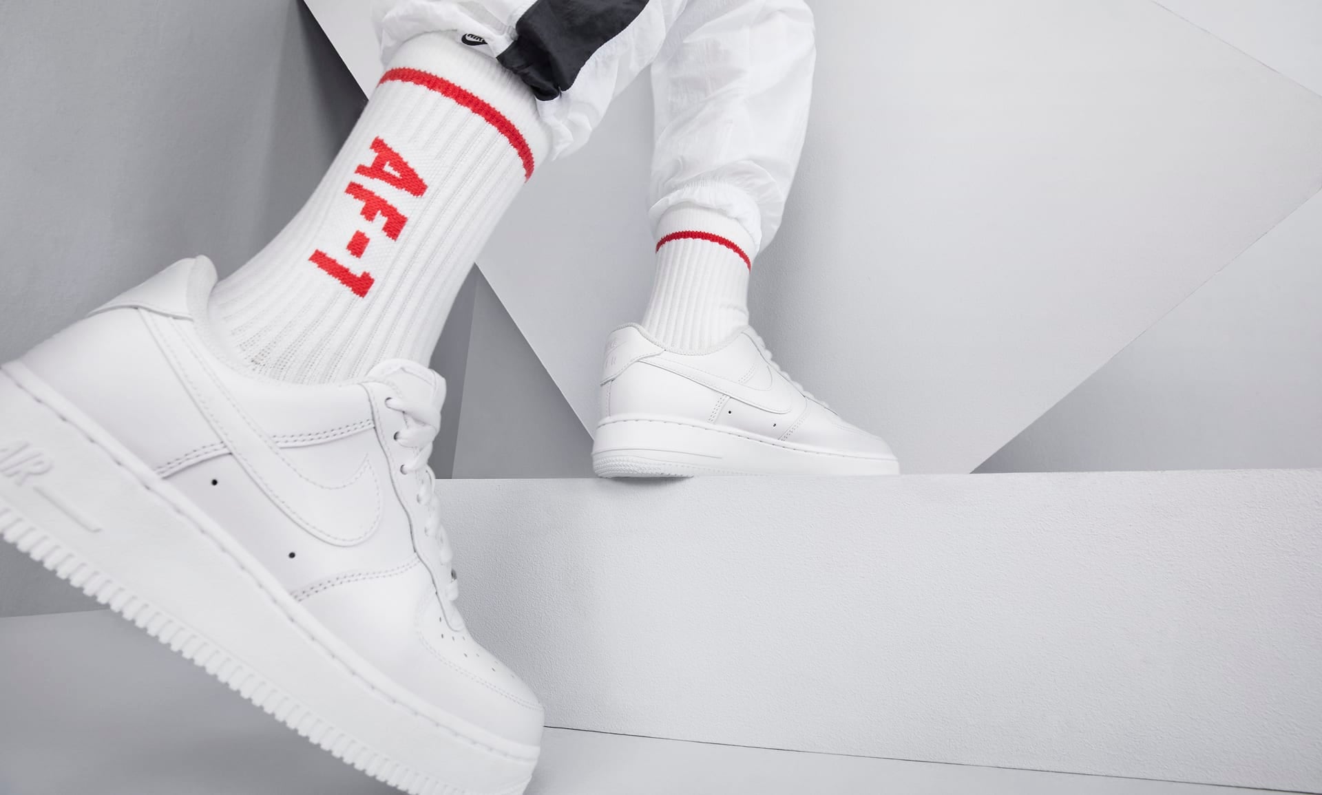 white nike air force 1s on feet