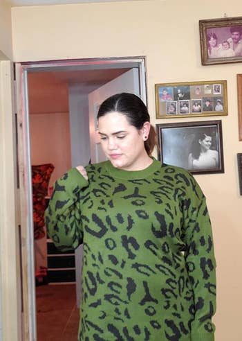 Another reviewer wearing the army green leopard sweater