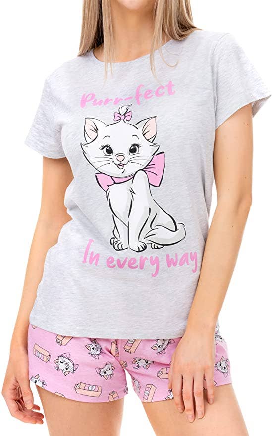 a model in a light gray pajama shirt with marie from the aristocats on it that says purrfect in every way and coordinating pajama shorts in pink