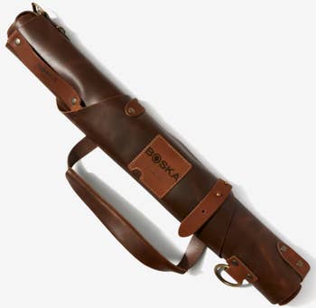 the brown leather apron folded up into a compact carrying case