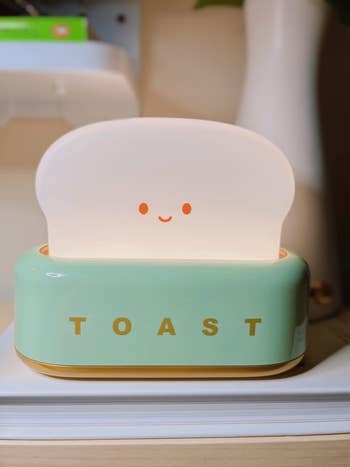 reviewer photo of the green toaster night light