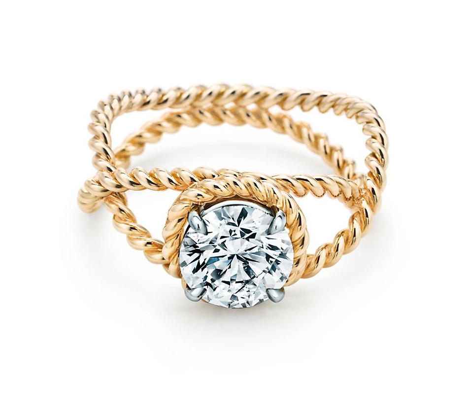 A diamond with a gold rope band