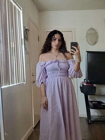 reviewer wears same dress in a purple pastel shade