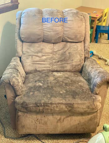 a tan suede recliner covered in dark black stains