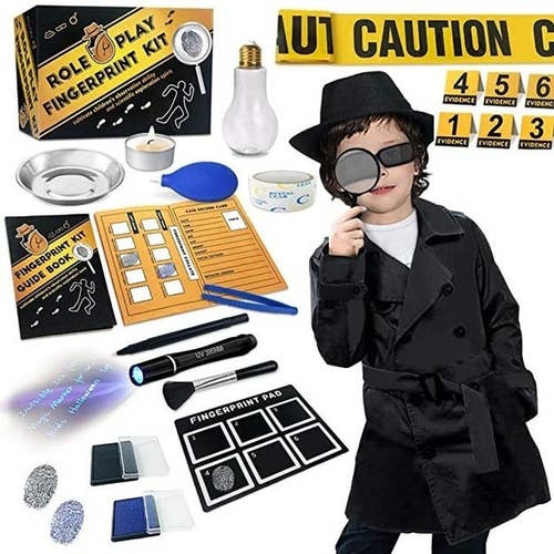 Child model wearing detective costume with complete packaging
