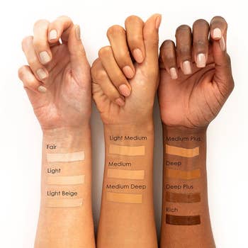 the concealers swatched on models with three different skin tones