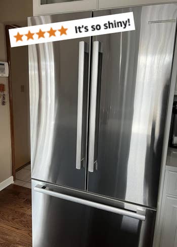 a shiny fridge with a 5 star review saying 