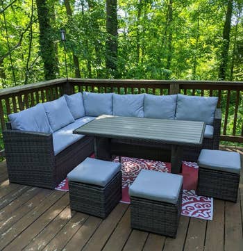 reviewer's gray dining sectional with three ottoman chairs
