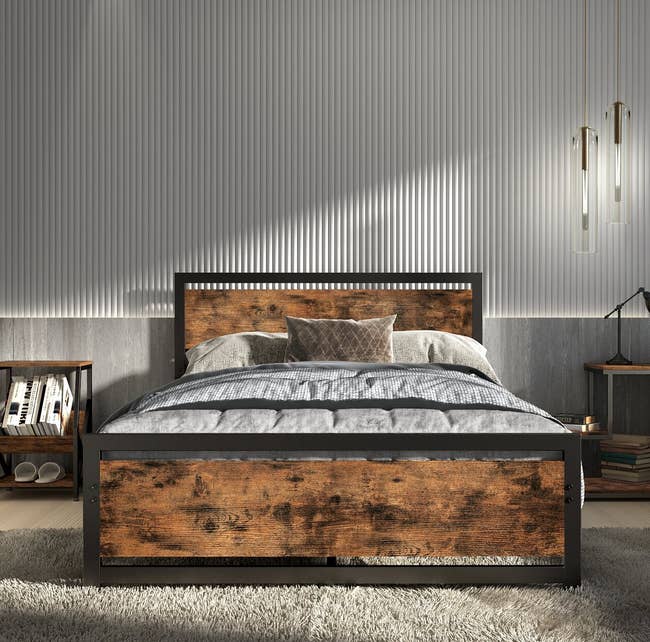 a wooden and black metal bed frame