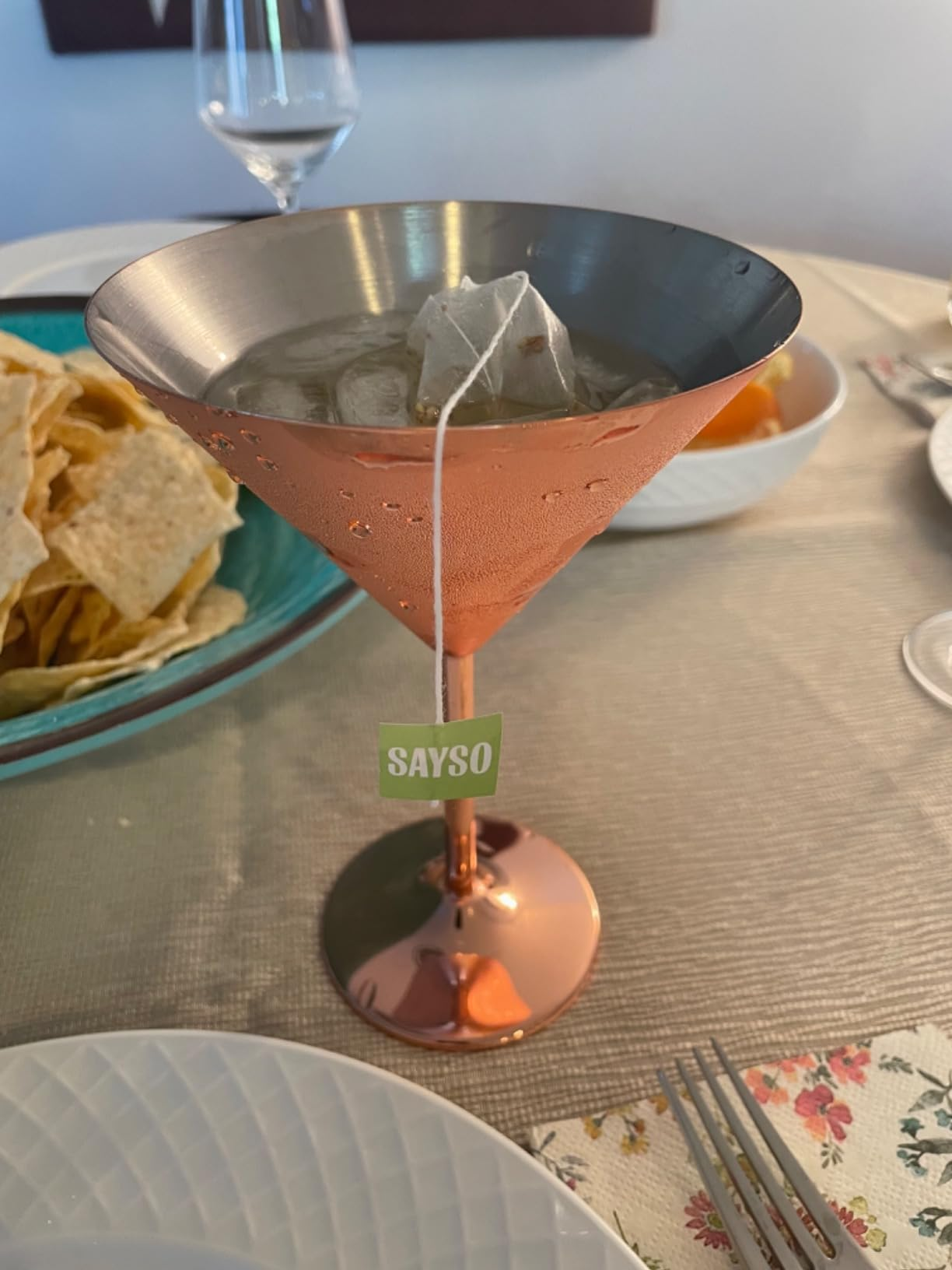 The Sayso alcohol mix-in in a copper martini glass