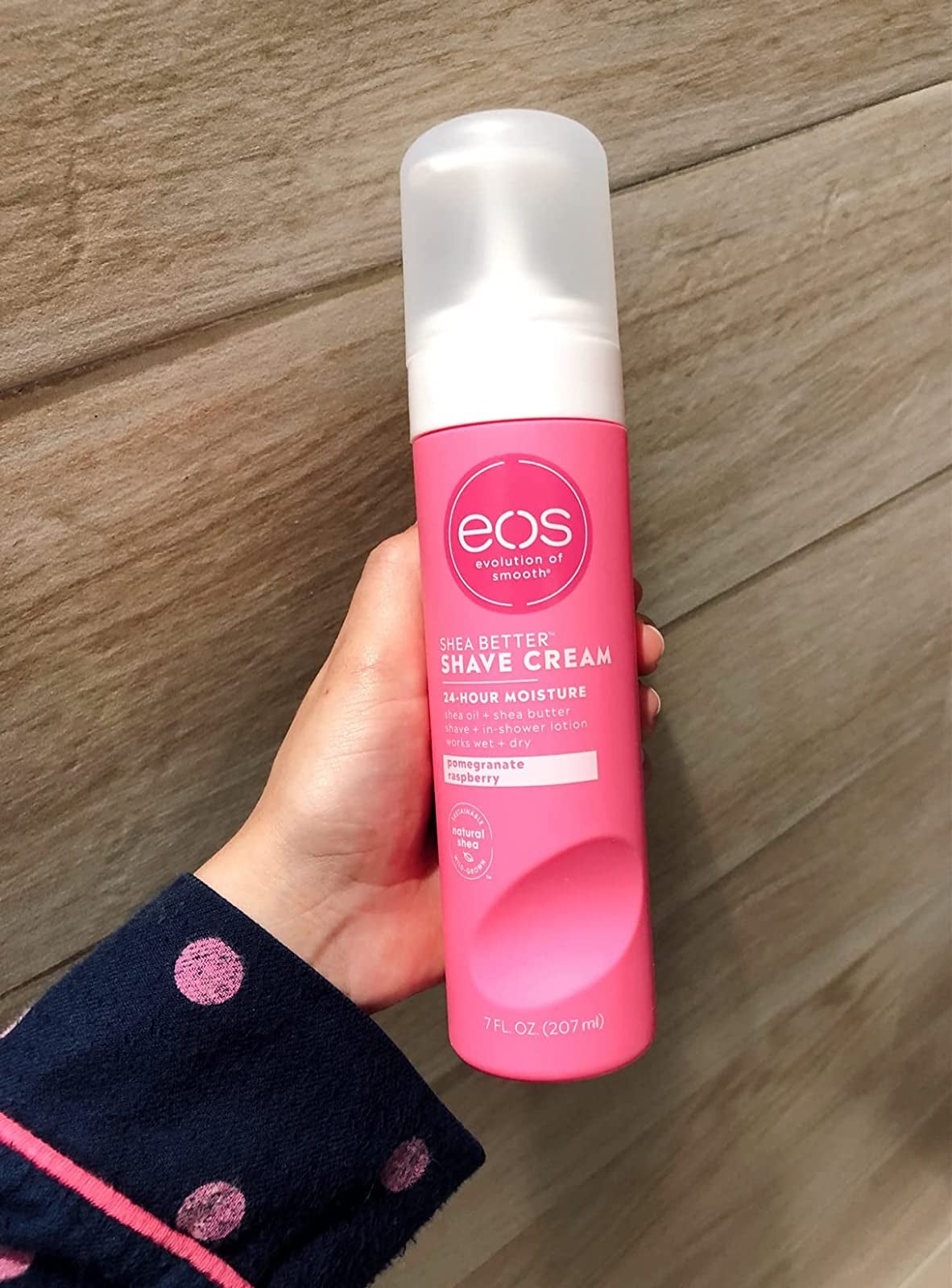 reviewer holding pink can of shaving cream