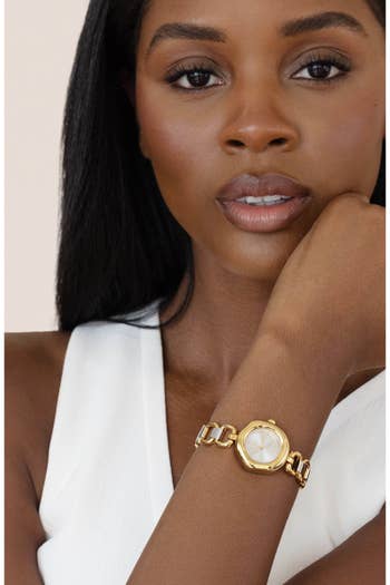 model wearing the ticker successful a mixed metallic style