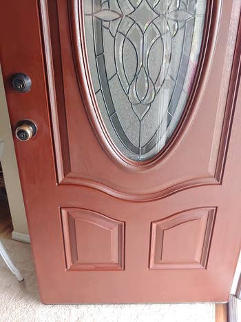 the same door after it was wiped clean and it looks like a rich mahogany color