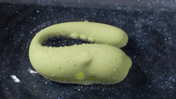 Gif of green vibrator in water