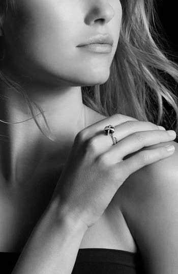 a model wearing the ring 
