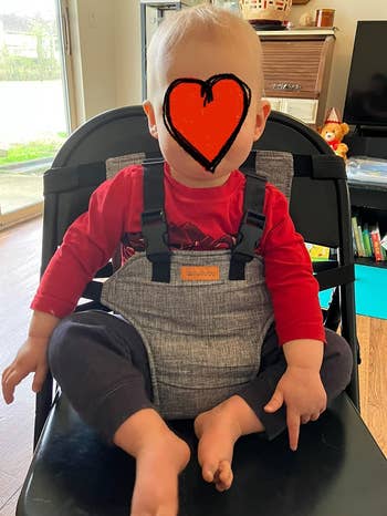 another reviewer's child sat on a chair using the harness seat