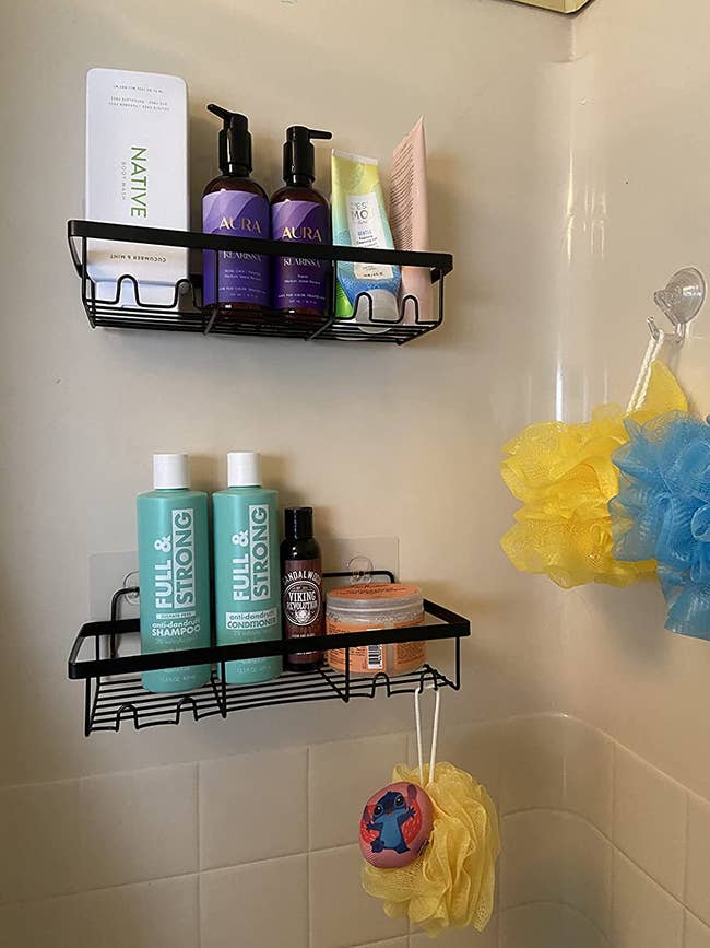 A reviewer's shower with their shower shelf in it