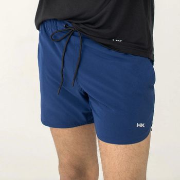 model wearing the shorts in blue