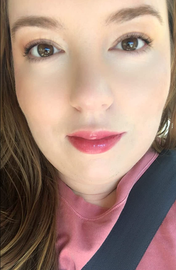 reviewer wearing lip glow