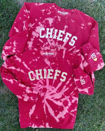 a red tie dyed chiefs sweatshirt