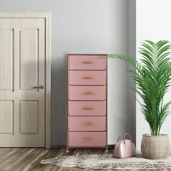 lifestyle photo of pink fabric dresser