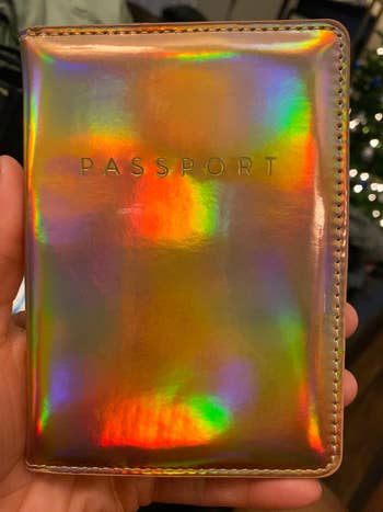 reviewer photo of gold holographic passport holder