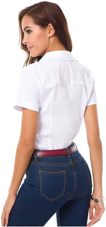 Image of model wearing white shirt with jeans