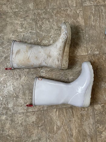 a reviewer's rubber boots, one stained with dirt and one clean