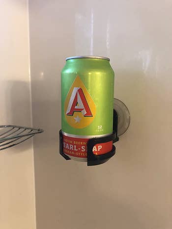 reviewer image of a beer can resting in the wine holder
