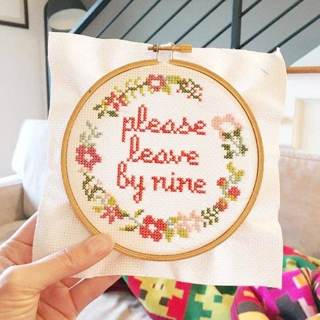 round cross-stitch with the words 