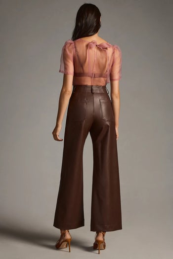 back of another model wearing the brown pants