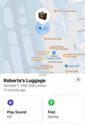 reviewer photo of the find my app showing their luggage on a map via the airtag