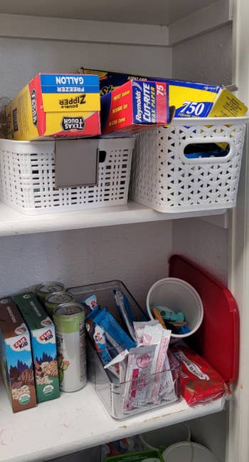 pantry shelf with ziplock boxes thrown onto shelf