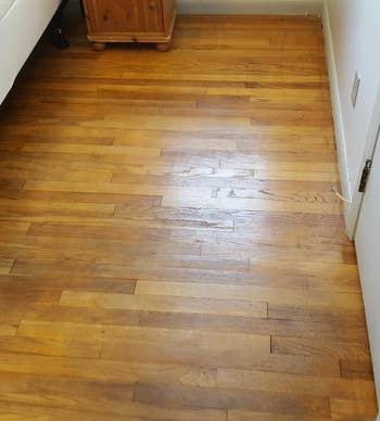 Same reviewer's picture of now shiny hardwood floor