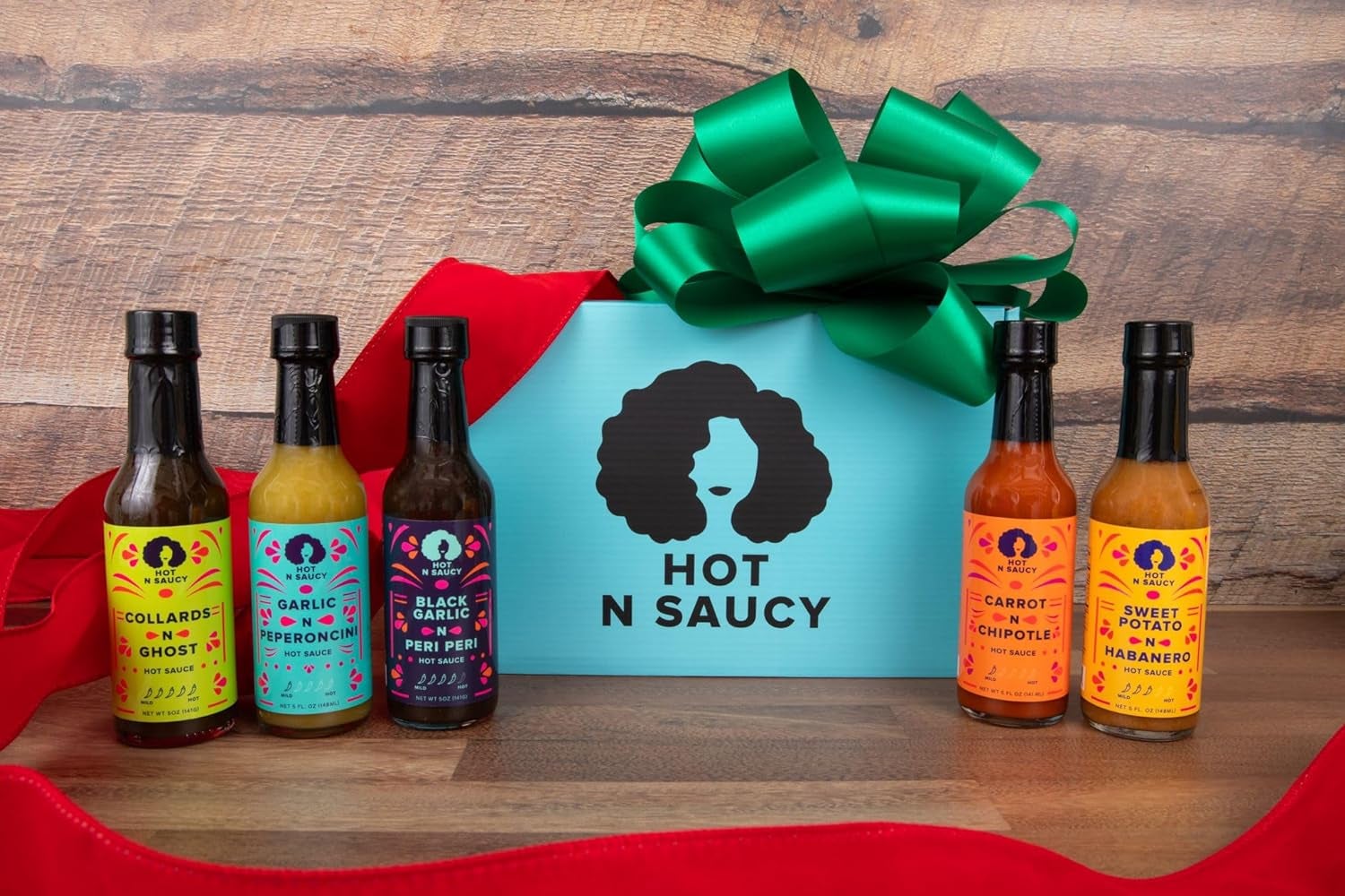 the gift box and five bottles of different hot sauces 