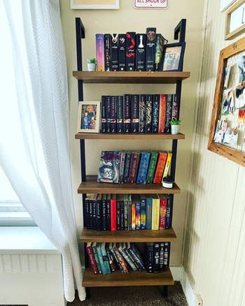 reviewer's bookshelf filled with assorted  publication  series