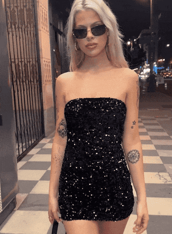 gif of model walking in sparkly dress
