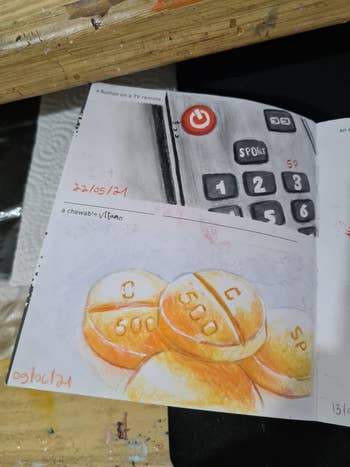 the inside of a reviewer's book showing a sketch of a TV remote and chewable vitamins