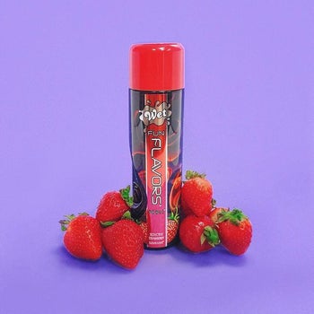 Strawberry lubricant surrounded by strawberries