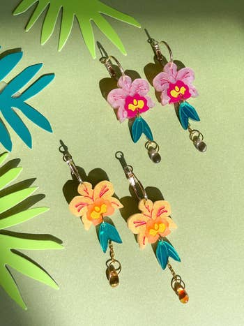 the orange and pink dangly orchid earrings