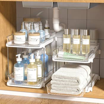 Under-sink storage shelves with various bathroom products