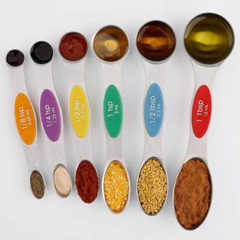 the set of measuring spoons with ingredients in each