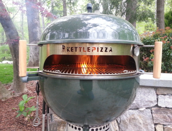reviewer image of kettle pizza kit on grill