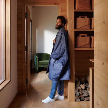 model wearing the coat indoors