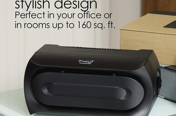 Product laying horizontal next to laptop on a desk