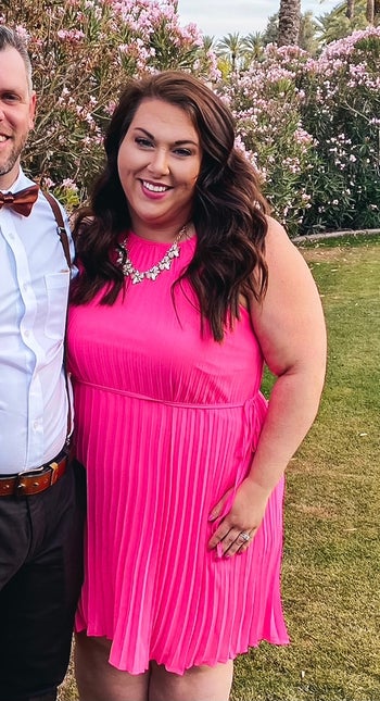 another reviewer wearing the hot pink dress